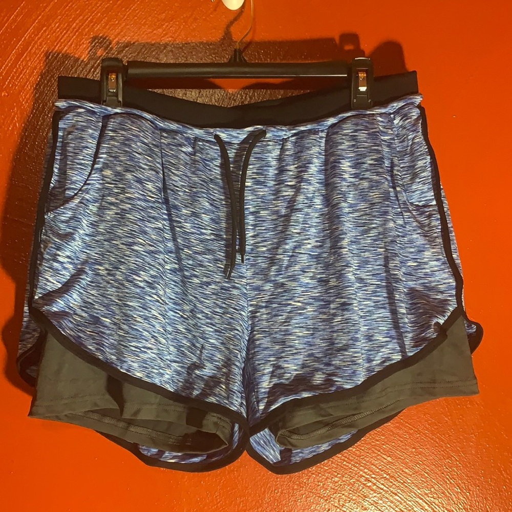 Blue exercise shorts, size large